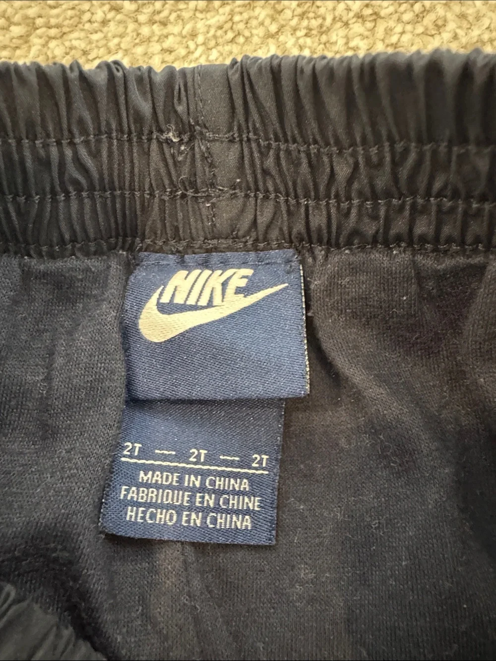 Nike Kids Navy Track Pants with Gray Side Stripes